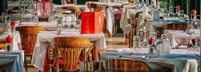restaurant table setup with menu on table