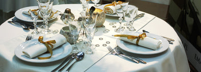 white tablecloth with retro flower cutlery